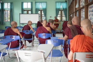 A class of young Monks in an English Class