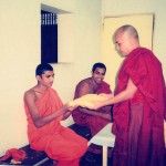 Sayadaw offering a robes Dana, donation on his birthday, Sri Lanka.